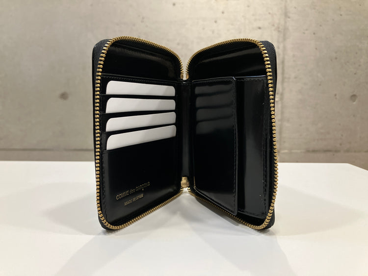 COMME des GARCONS WALLET / DOTS EMBOSSED ROUND ZIP WALLET / BLACK / 8Z-F021-051